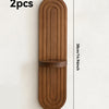 Two wooden wall shelves with a rustic arch design in a warm brown color.
