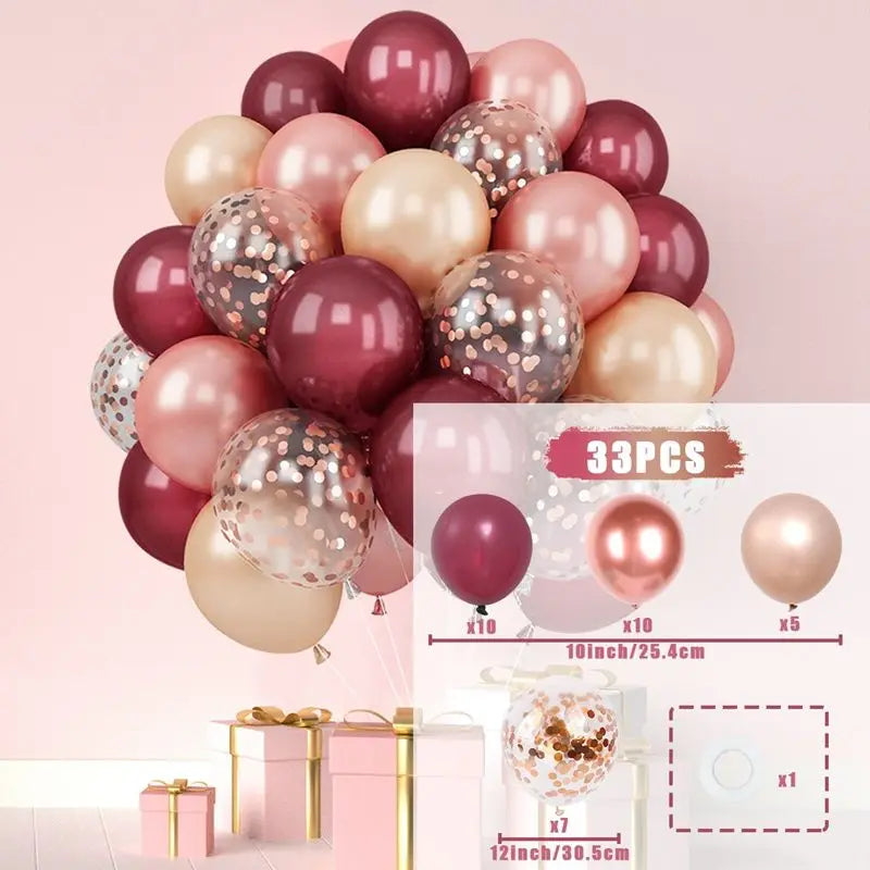 A collection of metallic pink and gold balloons with glitter confetti accents for party decor.