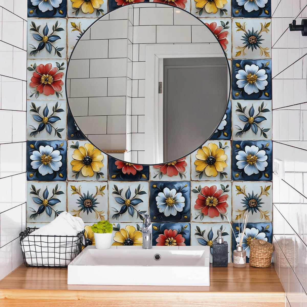 A bathroom vanity featuring a white sink and a large circular mirror surrounded by colorful floral tiles.