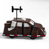 A brown 3D printed display model of a vehicle, resembling an interceptor, with a propeller on top.