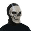 A realistic horror ghost skull latex mask worn by a person.