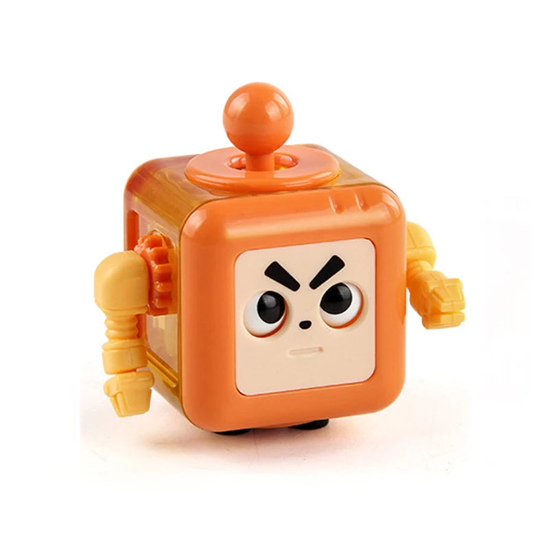 An orange fidget cube toy with a round top and sensory features.