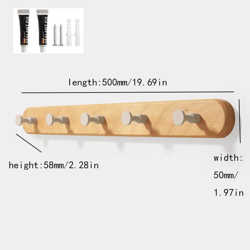 A light wood wall hook rack with four wooden hooks is shown alongside various nail and hook tools.