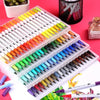 A collection of dual-ended watercolor art markers in various colors arranged neatly in a white plastic case.
