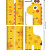 A yellow giraffe and dinosaur height chart wall stickers for kids' rooms showing measurements in centimeters and inches.