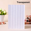 A transparent white PVC photo corner protector card with a geometric pattern is shown next to a potted plant.