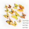 A set of twelve colorful 3D butterfly wall stickers in various sizes and shades.