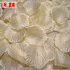 A close-up view of pale yellow silk rose petals used for weddings and events.