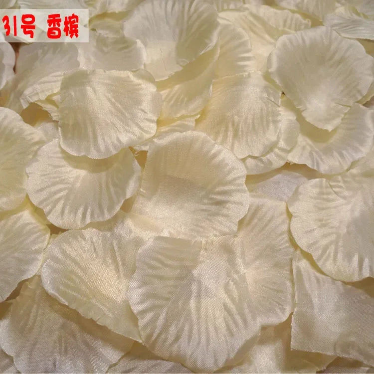 A close-up view of pale yellow silk rose petals used for weddings and events.