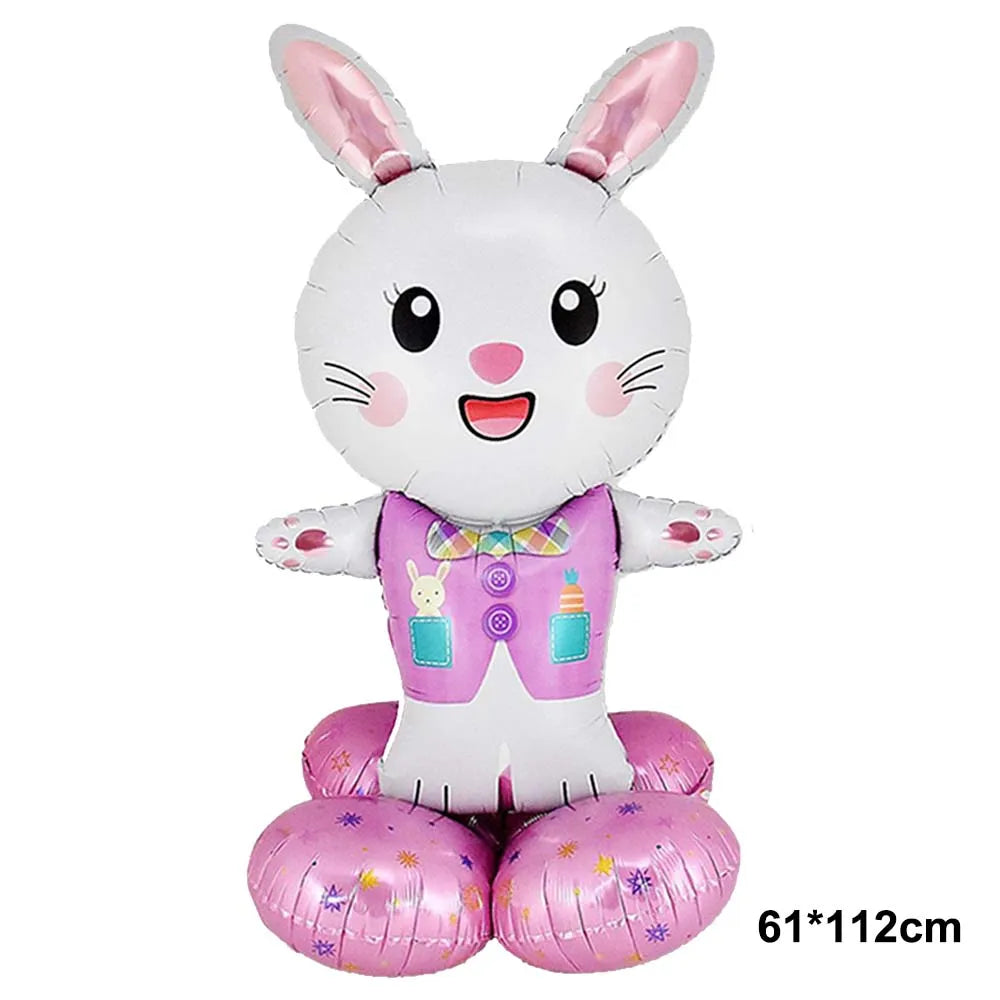 A cute cartoon white bunny foil balloon with pink ears and a purple outfit.