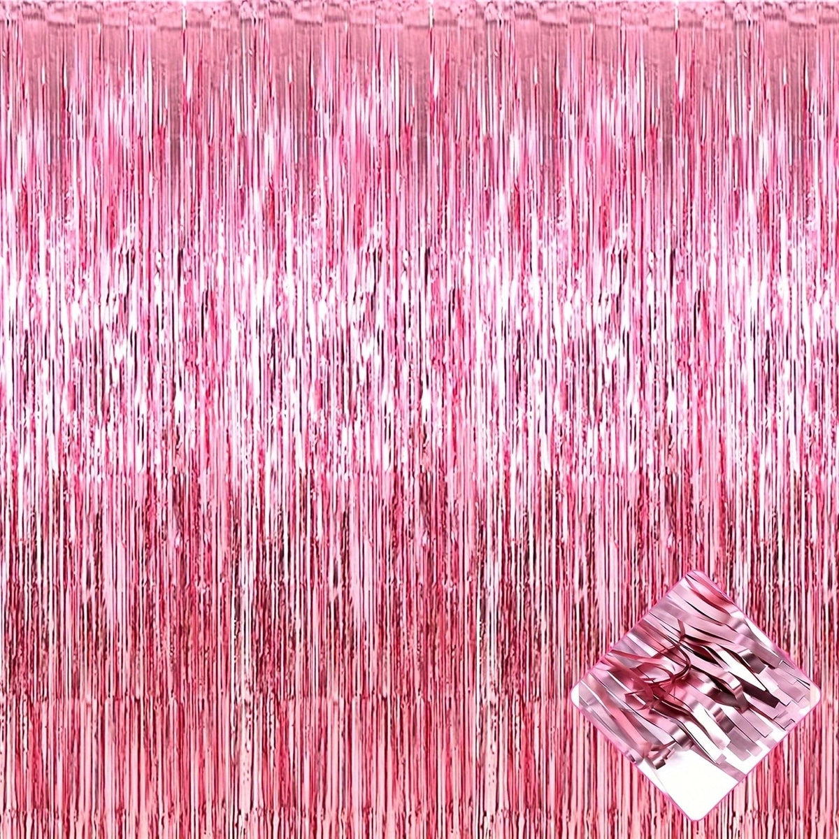 A close-up of a pink metallic foil tassel backdrop set with shimmering pink strands.