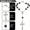A set featuring an elegant black rosary cross pendant and a matching bracelet.