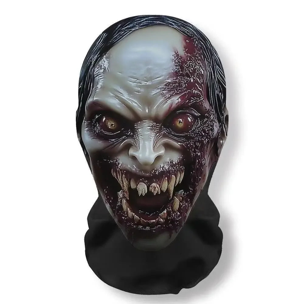 A realistic mask depicting a grotesque, bloody face with intense eyes and bared teeth for cosplay or party use.