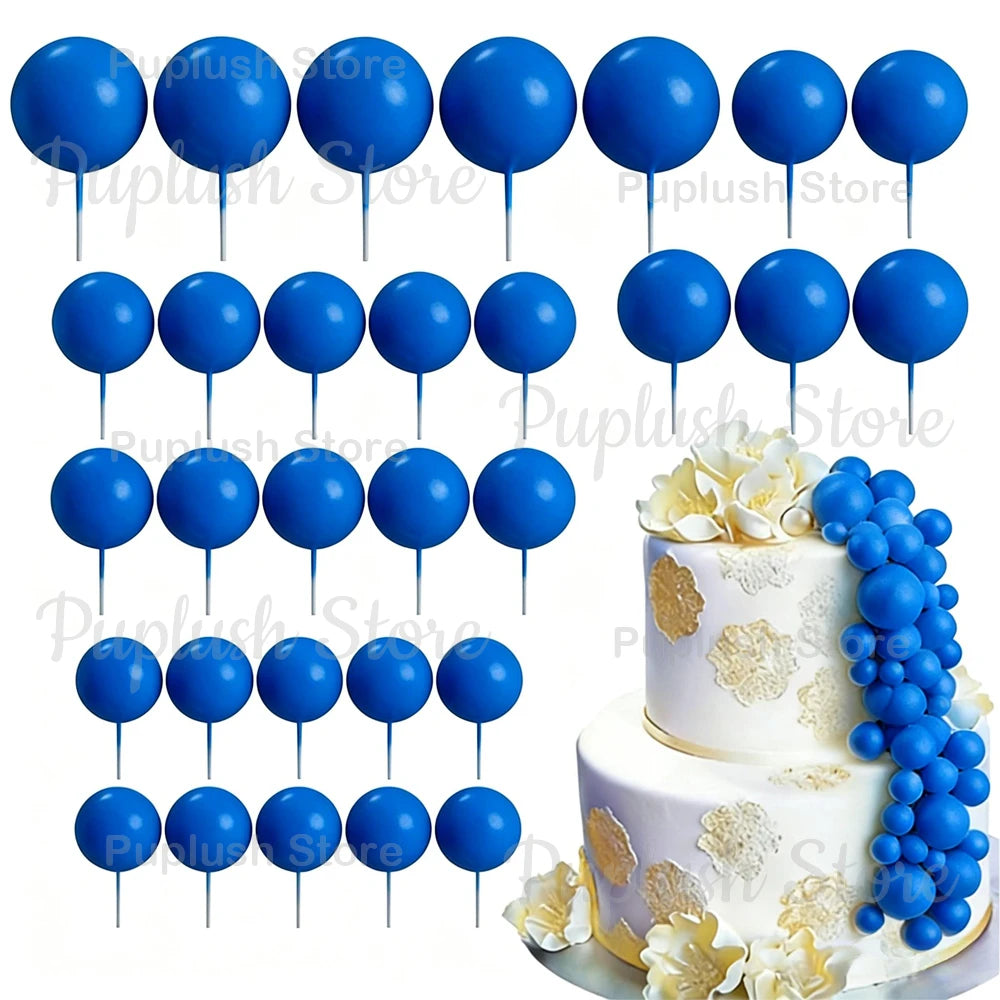 A set of blue foam cake toppers on sticks, including various shapes and sizes.