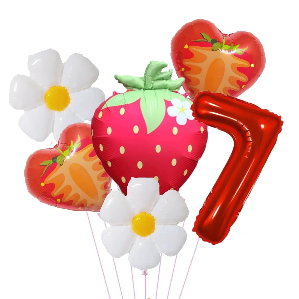 A set of six foil balloons shaped like hearts and numbers, including a large pink strawberry and red seven.