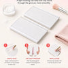 A set of white precision clay bead rollers and a pink dusting brush for cleaning tacky clay.