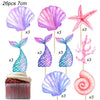 A set of 26 mermaid cake toppers featuring various colored seashells, starfish, and fish tails on wooden sticks.