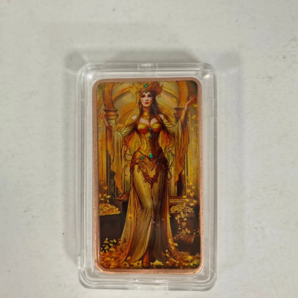 A fantasy art bar featuring a female figure in gold and orange attire housed in a protective clear plastic case.