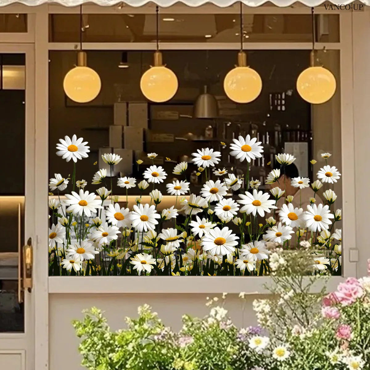 White daisy flower static cling window decals displayed in a glass storefront window.