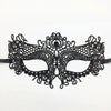 Elegant black lace half face mask with intricate floral and scrollwork design