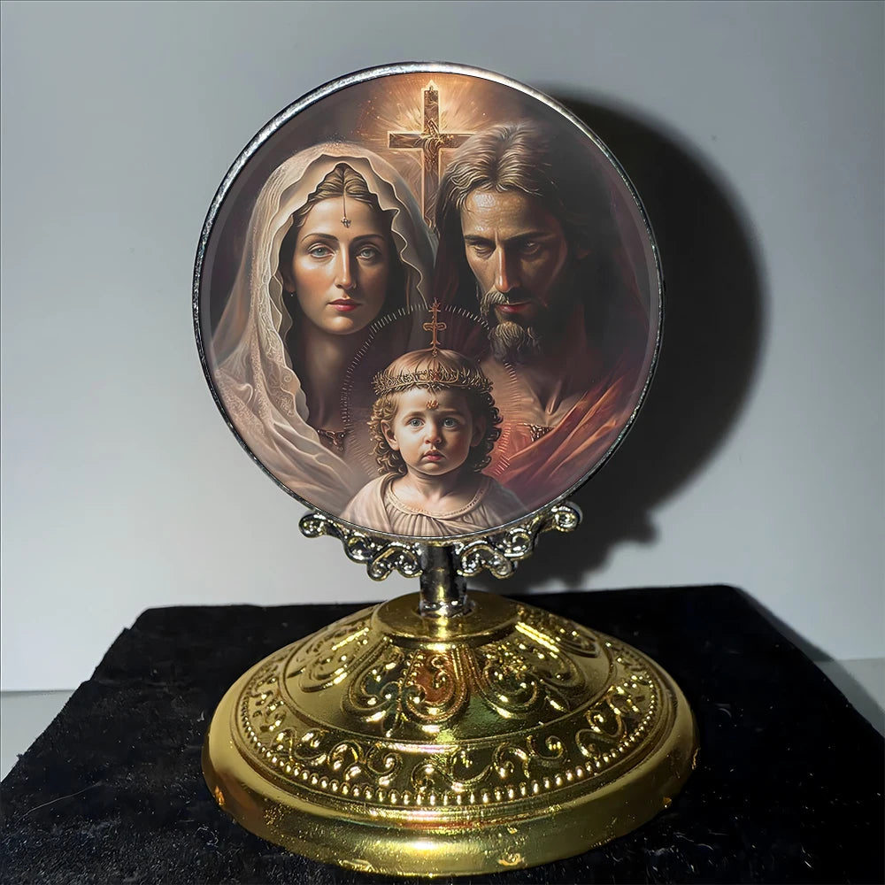 A round religious icon featuring the face of Jesus and a child, mounted on an ornate gold-colored base.