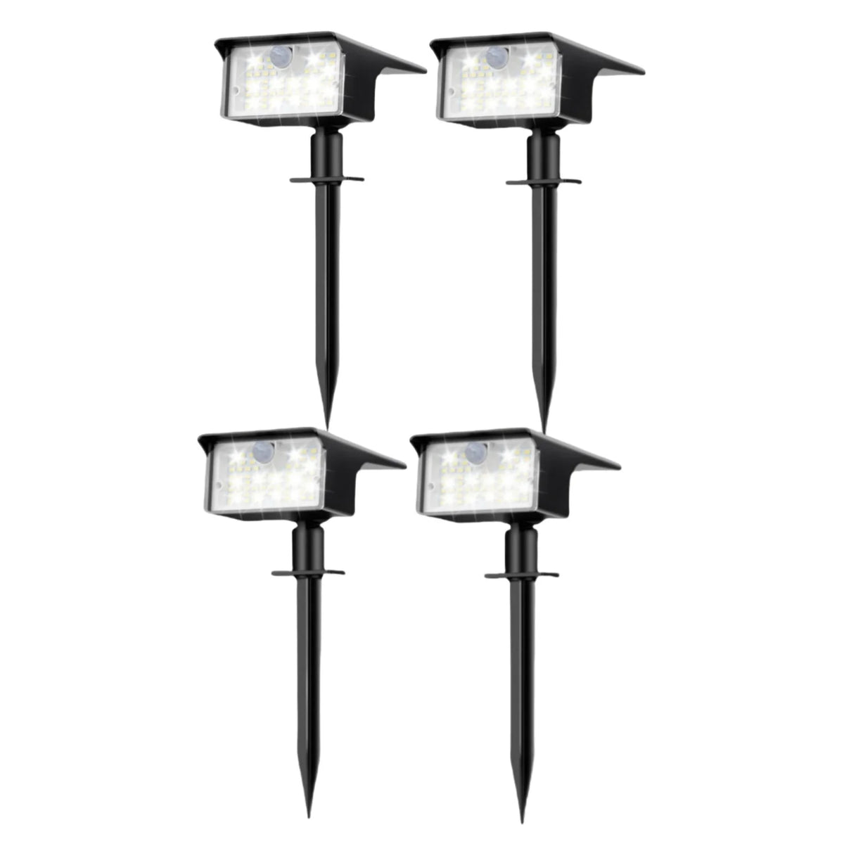 A pair of black solar powered motion sensor spot lights with LED illumination.