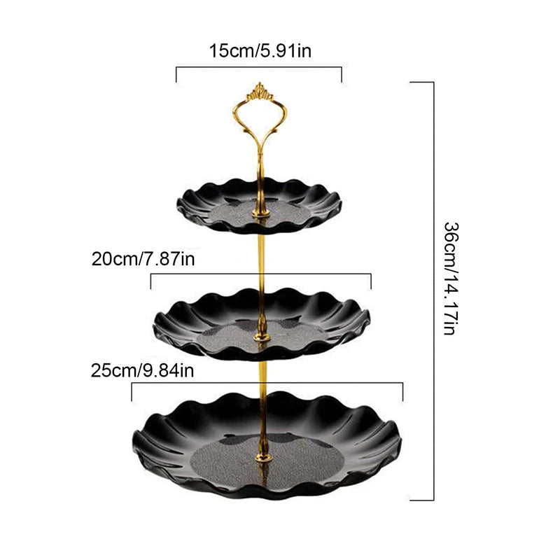 A two-tier serving stand featuring three black, scalloped plates with gold accents.