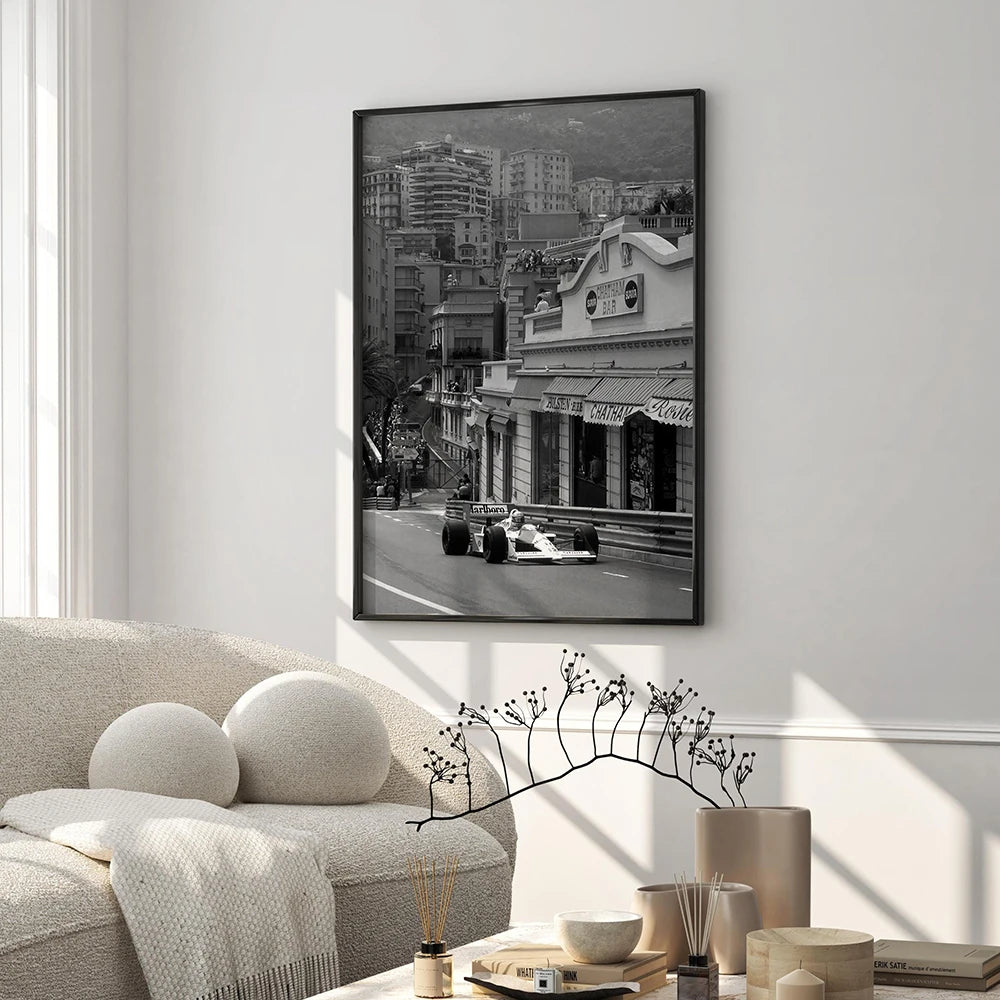 A framed canvas print featuring a vintage formula grand prix racing scene.
