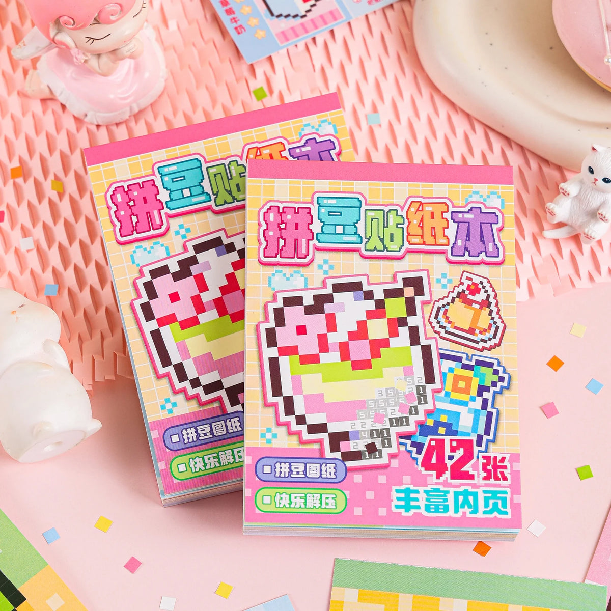 A set of pink and yellow die cut stickers featuring cartoon characters and text on a pink background.