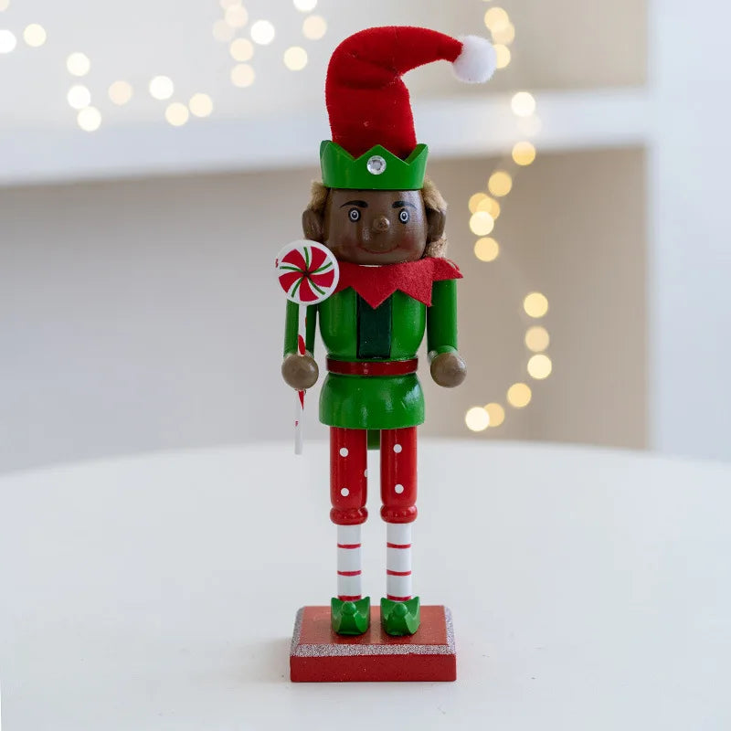 A handcrafted wooden nutcracker soldier figurine dressed in a green uniform and red hat standing on a red base.