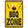 A yellow metal sign with black text reading BBQ ZONE and featuring crossed grilling tools and a flaming grill icon.