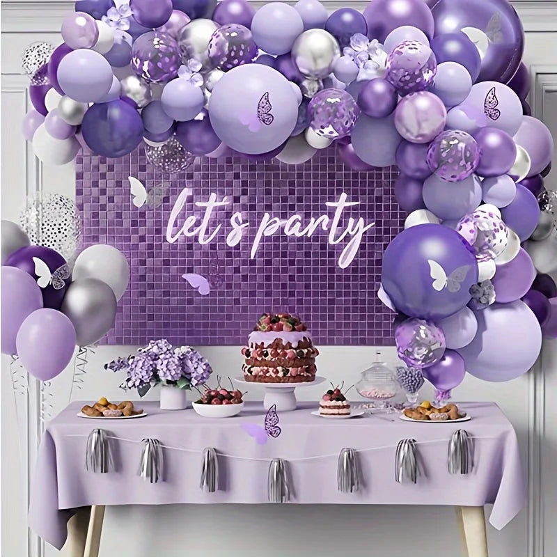 A purple and white metallic balloon garland arch kit featuring balloons arranged in a decorative display.