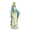 A white and blue statue of the Blessed Mother with a golden halo and wearing a Miraculous Medal.