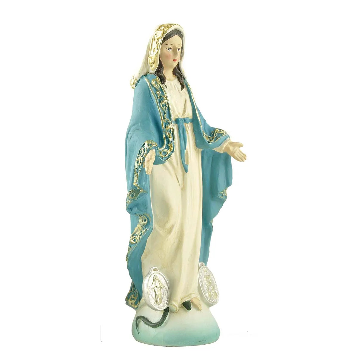 A white and blue statue of the Blessed Mother with a golden halo and wearing a Miraculous Medal.