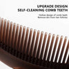Close-up view of a brown scalp massage comb with upgrade design self-cleaning teeth.