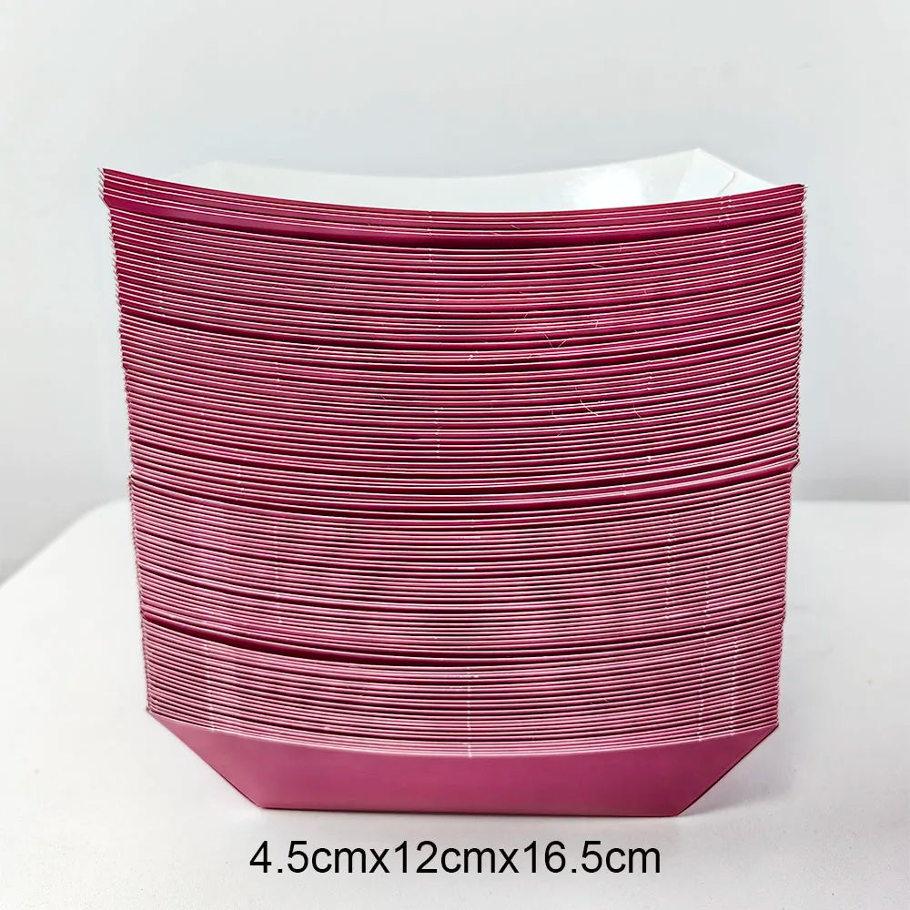 A stack of solid magenta disposable paper food trays for parties and events.