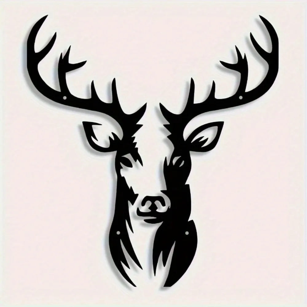 A black metal wall sculpture of a deer head with antlers.