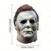 A realistic horror mask resembling Michael Myers with a pale, weathered face and brown hair.