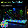 Aquarium decoration featuring glow-in-the-dark luminous pebbles creating an eye-catching glow effect.