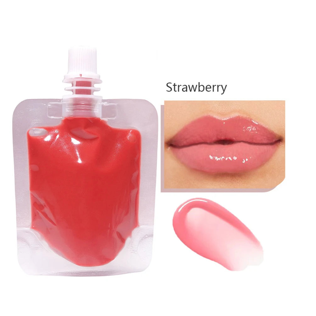 A small bottle of strawberry lip oil gloss next to a close-up of the product on lips.