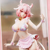 A pink cow-girl miniature figure with horns and a small gold bell, wearing a pink outfit.