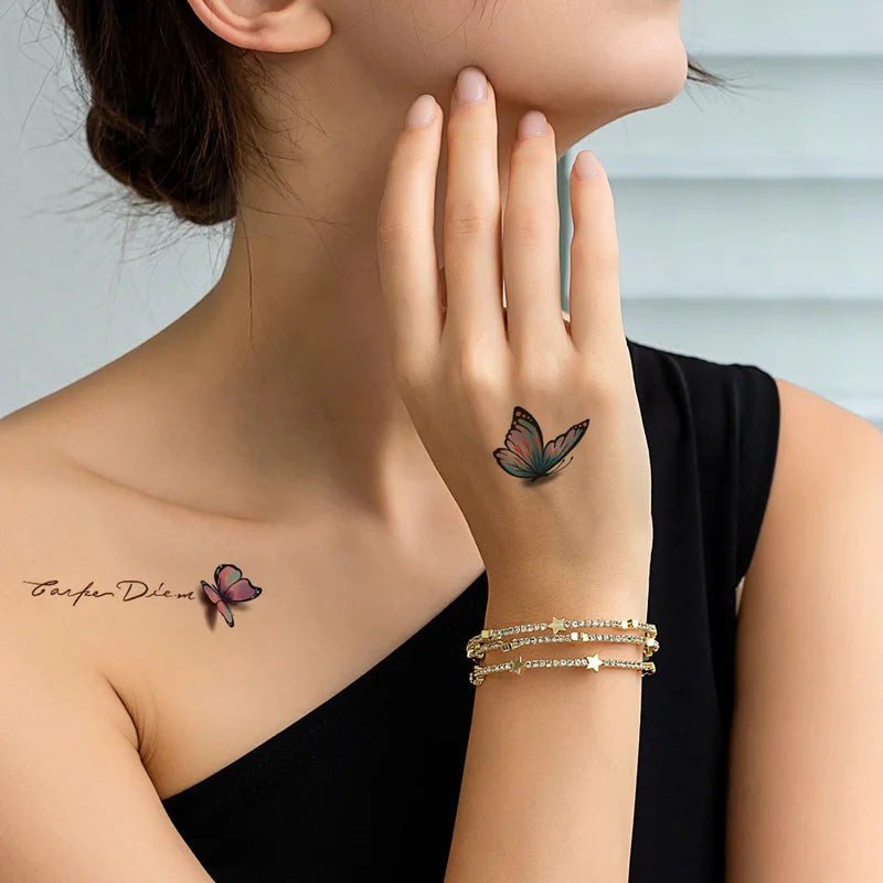 A hand wearing several gold and silver star-shaped temporary body art stickers on the wrist.