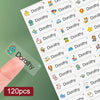A close-up of many custom waterproof name stickers featuring the name Dorothy for kids' belongings.