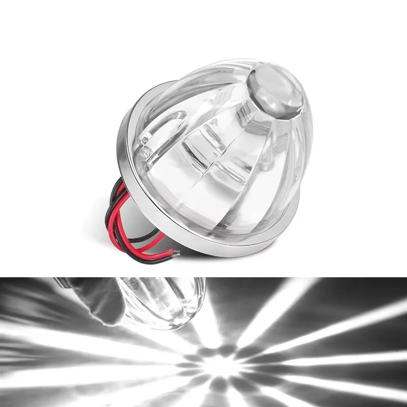 A close-up view of a clear LED side marker light assembly with red wiring visible, showing its beam pattern.