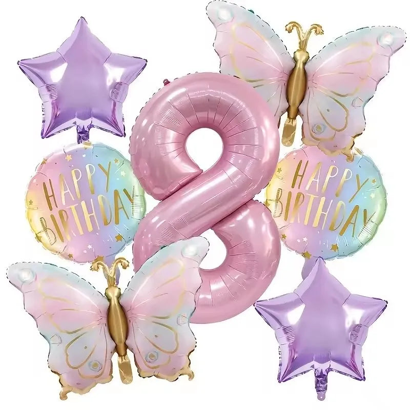 A set of seven pink butterfly and number balloons for a birthday party decoration