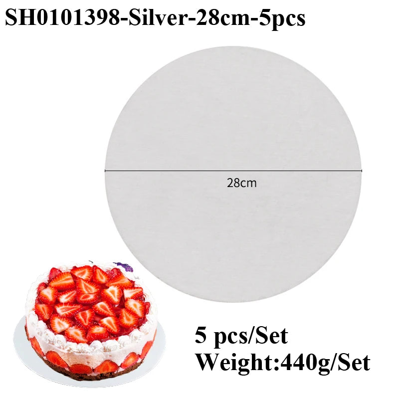 A round white cake board with a silver coating is shown next to five pieces of the product.