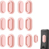 A set of pink magnetic silicone remote control holders shown in various shapes and sizes.