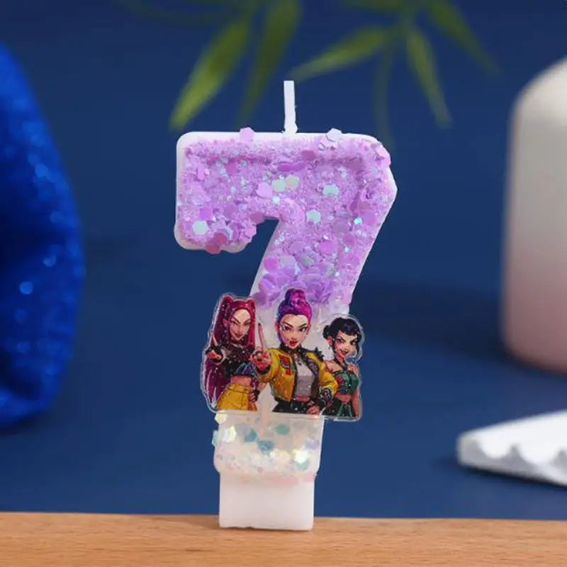 A purple glitter candle shaped like the number 7 featuring characters from a fantasy series.