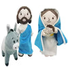 A plush doll depicting Jesus and the Virgin Mary, with Jesus having a beard and Mary wearing a blue mantle.