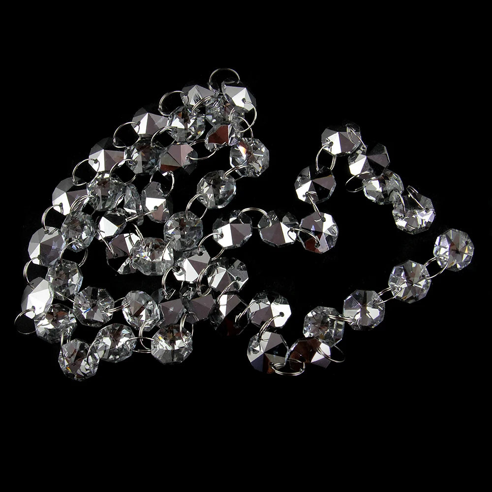 A close-up of crystal glass octagon bead curtain strands arranged in an elaborate, flowing pattern.